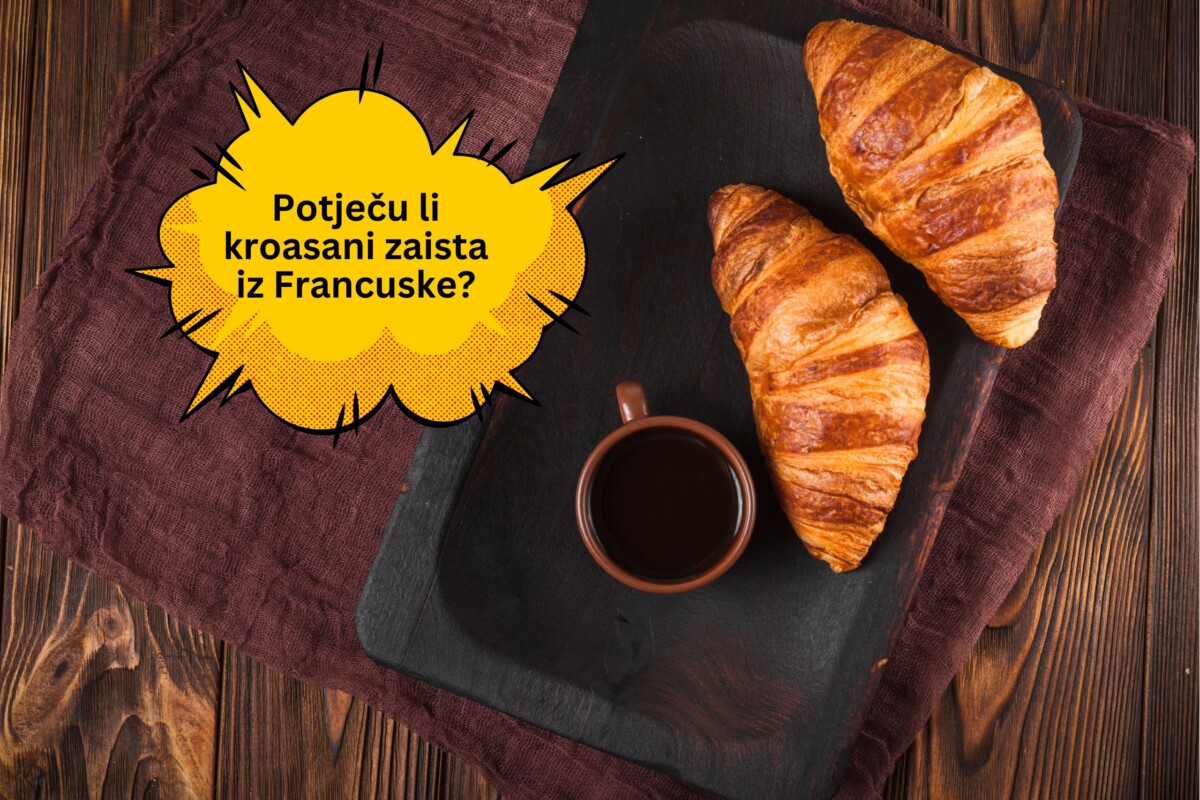 Dvije kroasane i šalica kave na tamnoj drvenoj podlozi, uz ilustrirani oblačić s pitanjem: 