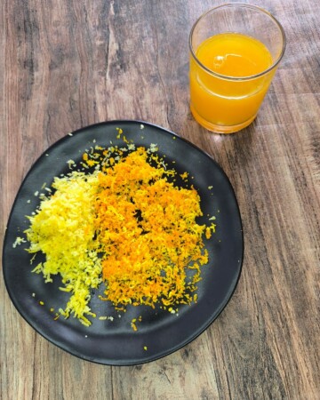 Naribana korica limuna i naranče za pincu na tanjuru